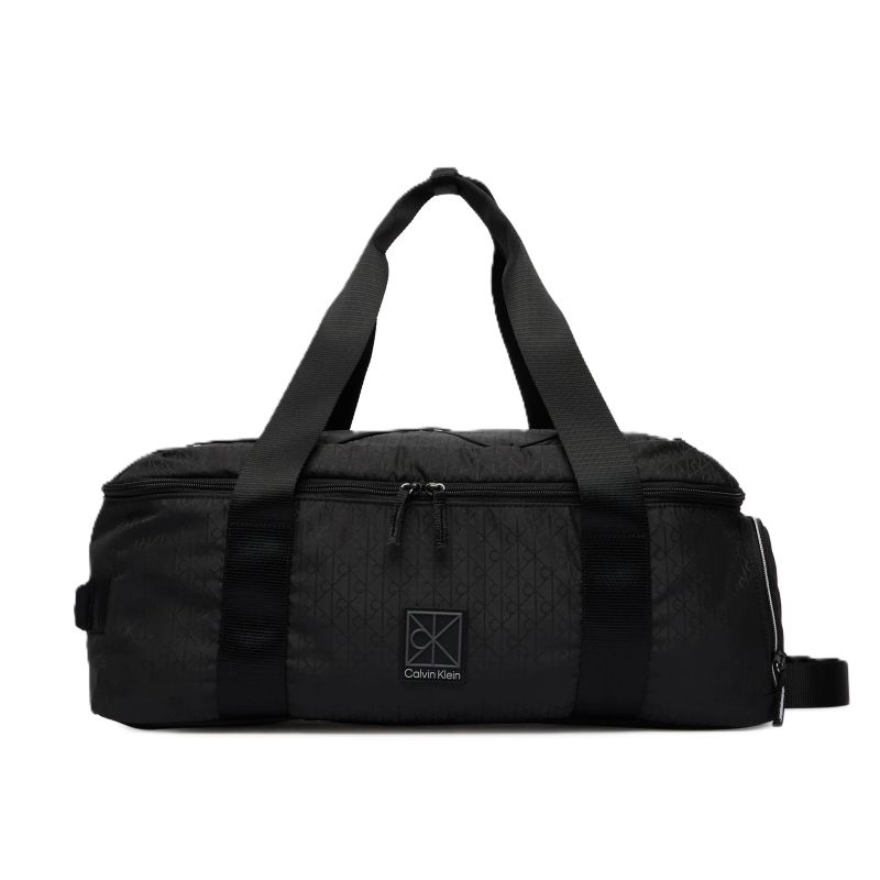 Geanta Calvin Klein UTILITY EMBLEM AOP DUFFLE Unisex